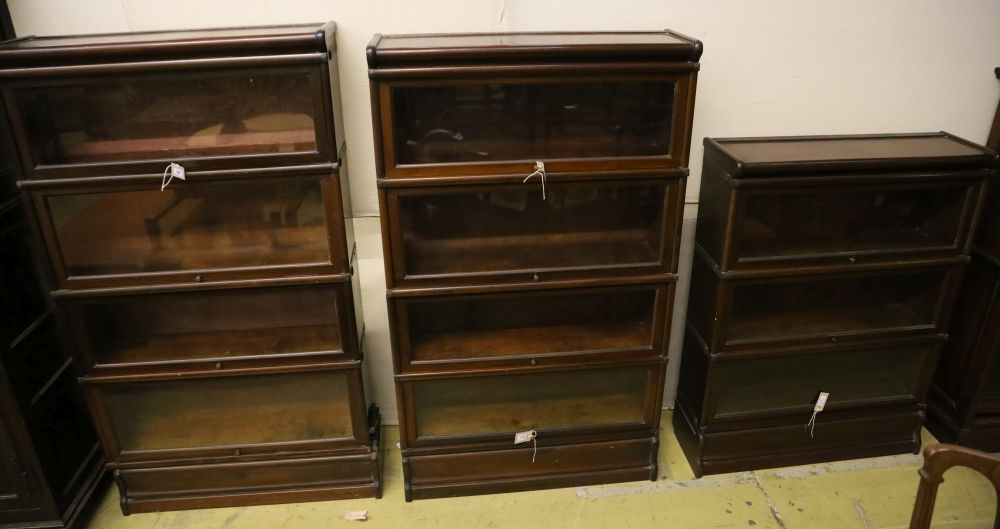 A set of two Globe Wernicke four section mahogany bookcases and a three section Globe Wernicke bookcase, width 86cm, depth 27cm, larges